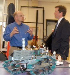 Page image: Commissioner Bowen speaks with a Sanford Regional Technical Center instructor.