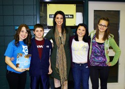 Cassandra's Angel A guest author poses with Bonny Eagle Middle School students.