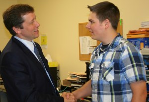 Commissioner Stephen Bowen meets Jack Wheeler, recent graduate of the SPICE Family Literacy Program.