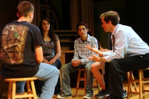 Students share feedback on Troy Howard Middle School's standards-based system with Commissioner Bowen.