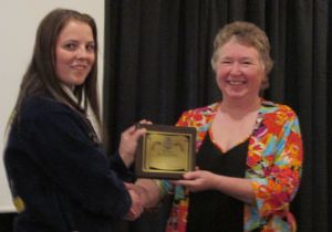 Maine FFA State President Whitnie Bradbury bestows Honorary State Degree upon Maine DOE employee Elaine Briggs