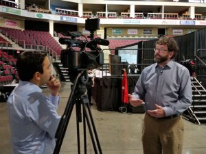 Director of Maine Learning Through Technology discusses micro-credentials to a reporter at ACTEM's annual conference