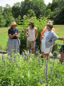 Bonnie Brown instructs teachers about growing flowers at Shaky Barn Farm Gardens in Livermore