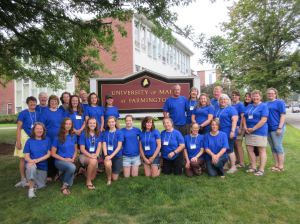 Maine Agriculture in the Classroom Summer Institute participants enjoy a final group gathering outside their classroom at the University of Maine at Farmington