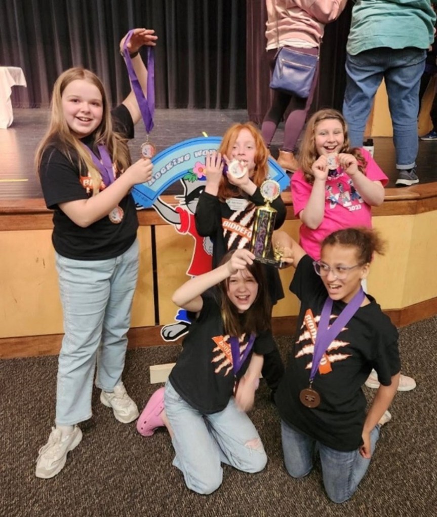 Biddeford Middle School’s Performance Team are Maine State Odyssey of the Mind 2nd place winners and World Finalists. Front row (left to right): Amelia Ireland and Adalina Morrill; Back row (left to right): Maisie Giddings, Baxter Belanger, and Kalina Simard (not pictured: Anja Lunianski).