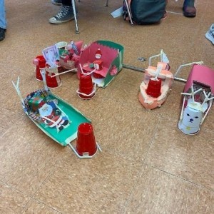 Several of the student-designed Santa sleighs.