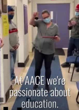 student ringing cowbell