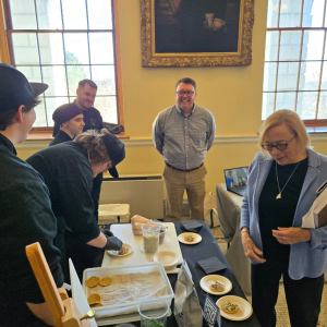 Governor Mills visiting displays during the event.