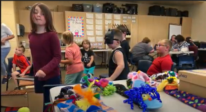 students with puppets