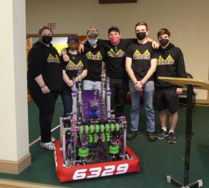 Team members sporting their Penobscot Narrows Bridge themed t-shirts at community presentation.