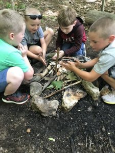 students starting a fire