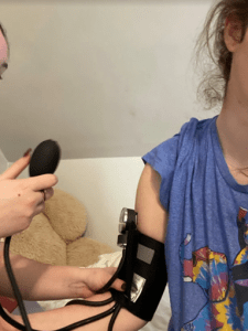 Nursing student showing how to do labs at home