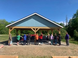 STARS students cutting the ribbon on their outdoor classroom
