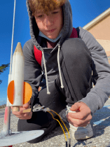 student building a rocket