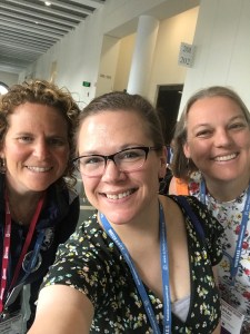 three women pose for picture