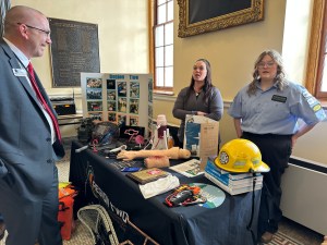 Left to right: Dwight Littlefield, Maine DOE; Alison Britton, Region Two in Houlton; and Sofia Scott a student at Region 2 School of Applied Technology in Houlton. Scott has tried the Welding and Auto Collision Repair programs.