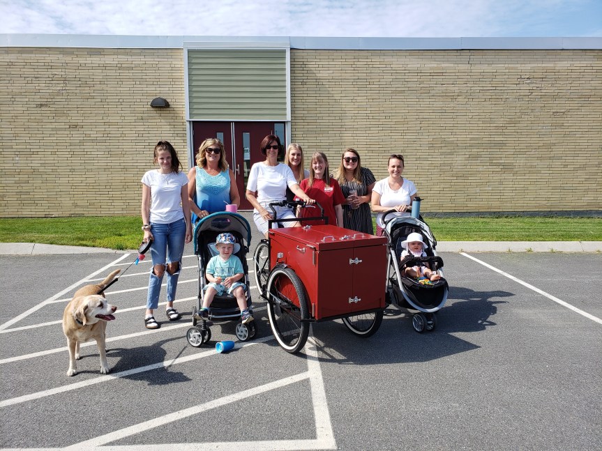 Downeast School Teachers and Staff Distribute Books to Children via Bicycle&nbsp;Library