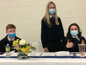 Head Table, Maine FFA 2021-2022 State Officers Ryder Brewer (Secretary-Treasurer), Delaney McKeen (Vice President) and Nickie Deschaine (President)