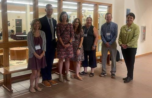 Left to Right: Dr. Kayla Sikora, Director of Augusta Adult and Community Education; Daniel Chuhta, Deputy Commissioner at the Maine Department of Education (DOE); Erica Carley Harris, Policy Analyst for the Maine Jobs & Recovery Plan; Megan Dichter Maine State Director for Adult Education; Lisa Robertson, Director of York Adult Education; Jeremy Lehan, Director of RSU 54 Adult Education; and Megan Welter,  Associate Commissioner of Public Education at Maine DOE