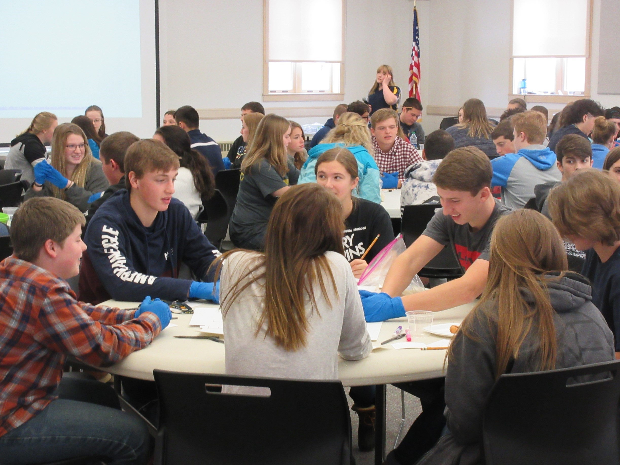 Considering Positive Influence in Leadership (left to right at table in foreground, five students facing camera): Hunter Cunningham, Ashland Middle School - Nick Margeson, Caribou Technology Center – Madelyn Buzza, Presque Isle Regional Career & Technical Center (PIRCTC) - Creed Chasse, Ashland High School – Maggie Currie & Clay Gregg, PIRCTC