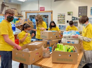 United Technologies Region 4 Bangor Horticulture FFA students sorting homeless shelter items