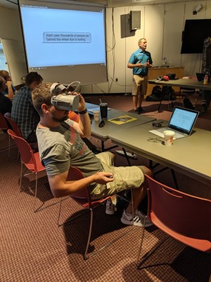 educator wearing VR goggles