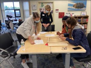 Tammy Ranger, Maine DOE Teacher Excellence Coordinator watching students at the Future Teachers Academy