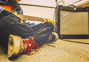 student playing guitar