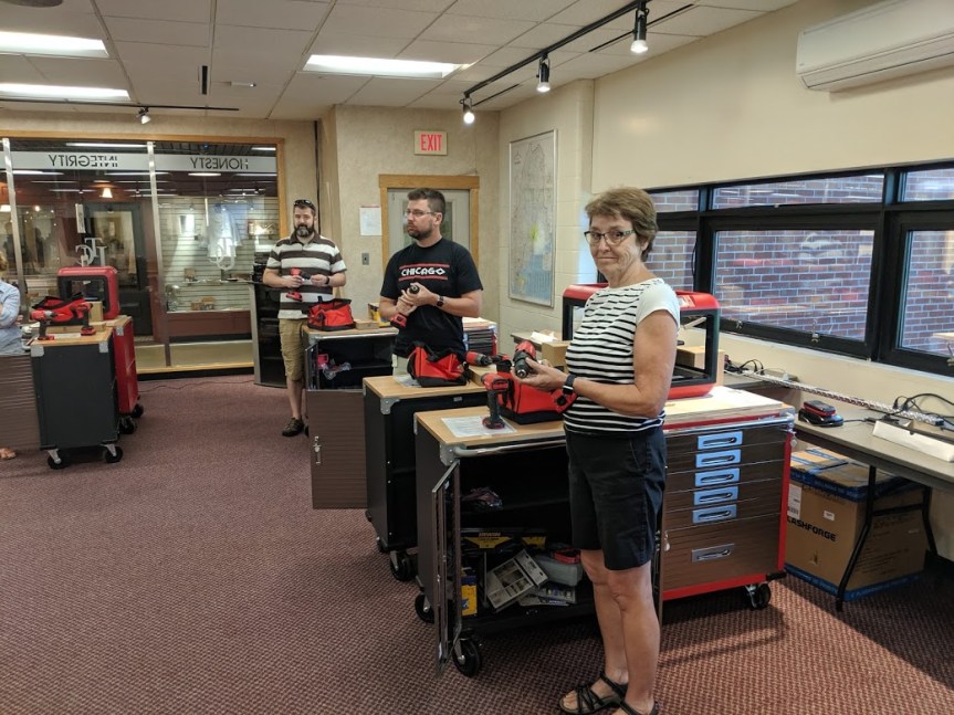 Educators standing with STEAMRoller Carts