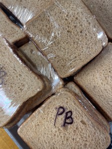 A stack of peanut butter and jelly sandwiches.