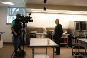 Walter Beesley being interviewed by Channel 8 news.