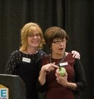 two educators posing together smiling