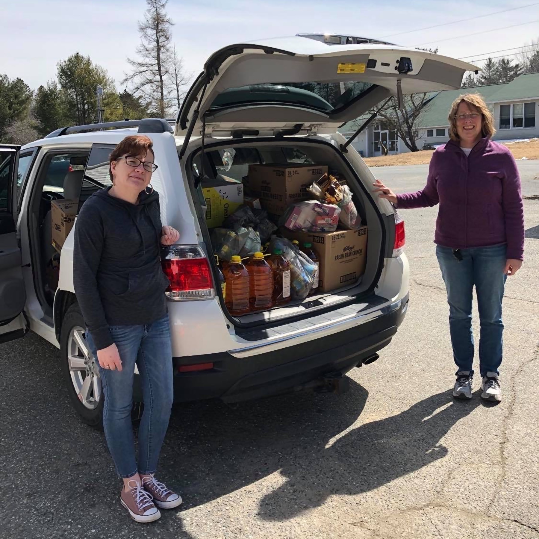 Food Delivery – Megan Smith, Community Resources Coordinator at Maine Seacoast Mission Food Pantry in Cherryfield, receives Narraguagus FFA Chapter Advisor Caroline Foote’s delivery of donated food