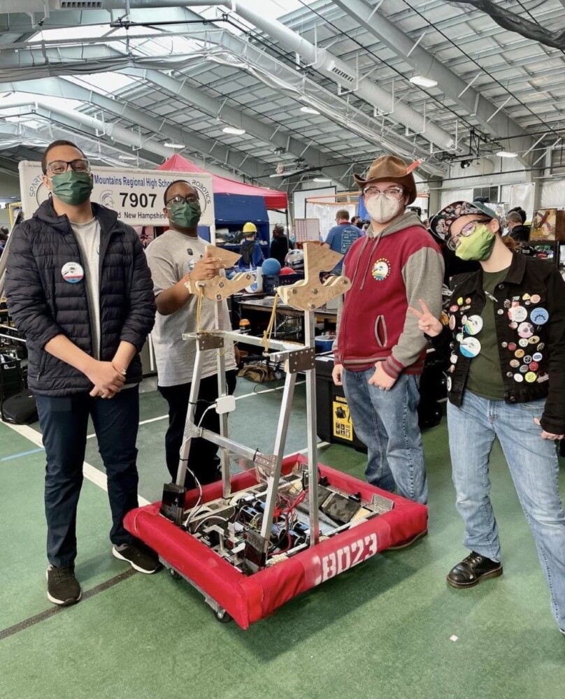 Team LRTC 8023 with their robot. From left to right: Ahmed Hussein, Omar Osman, Jacob Willette and Chance Tuttle.