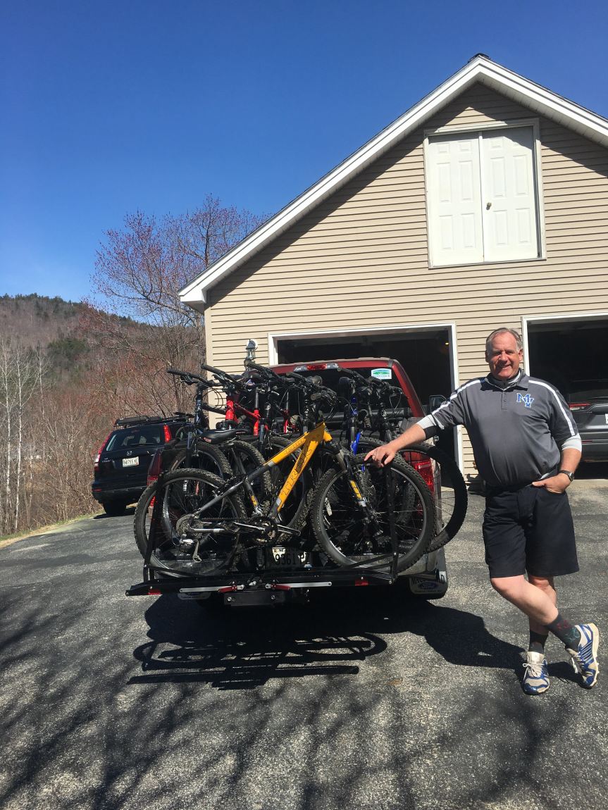 Todd Papianou standing next to bikes