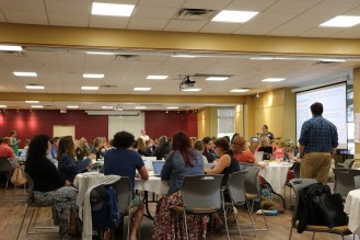 room full of educators sitting at tables