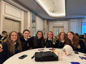 Students sitting around a table