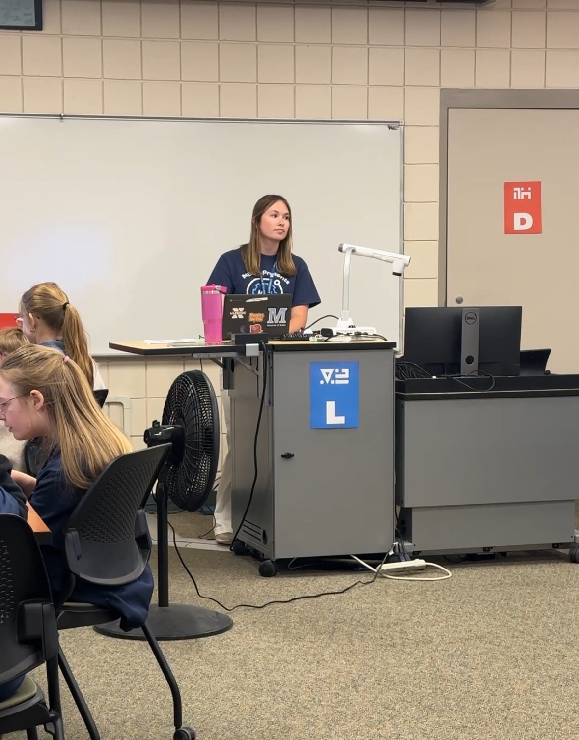 A Student Leadership Ambassadors of Maine (SLAM) presenting.