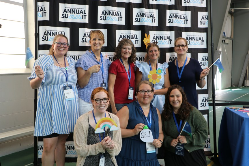Teachers gathered for a group picture.