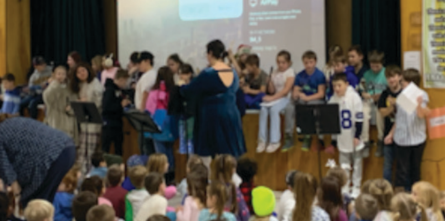 Students and staff gathered for a PBIS school share assembly