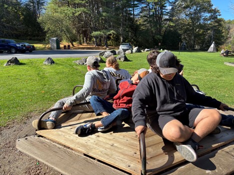 Student participate in relationship building activities during their field trip to their local community. 