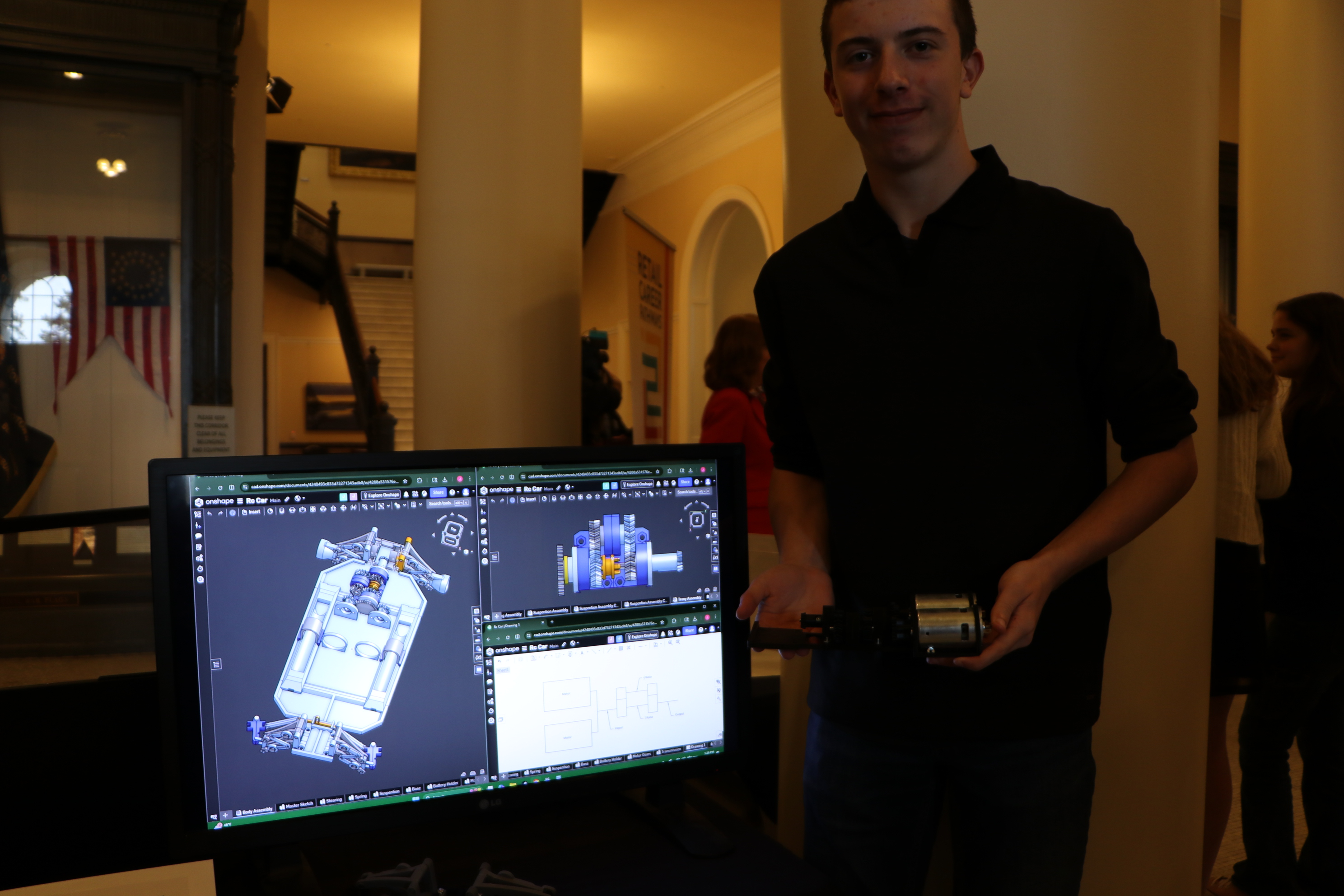 Jack, a student at Gorham High School (Gorham School Department), showcases a 3D printed RC car as part of his ELO project. Jack earned physics credits for his project.