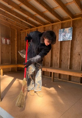 Students from Presque Isle High School’s Pathways Program participate in spring cleaning at the Francis Malcolm Science Center in Easton.