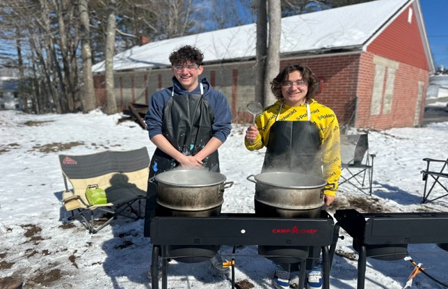 Katahdin Program students boil sap they collected.