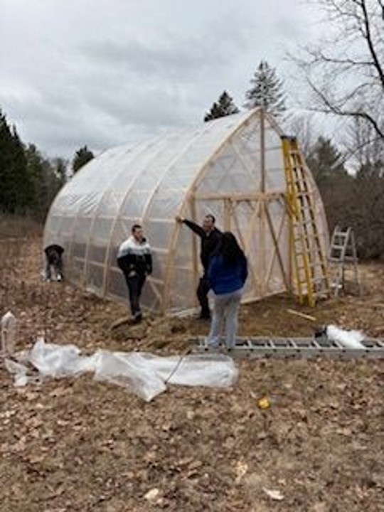 Katahdin Program students build a bow shed for use as an outdoor classroom.