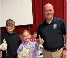 Brian Ewenson and two students from Wiscasset Elementary School! The students were wearing space gloves! 