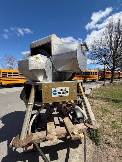 The Lunar Lander, which was built by one of the presenters and towed from New York to Maine so it could sit in front of the Mt. Ararat Middle School to Welcome students to Space Day