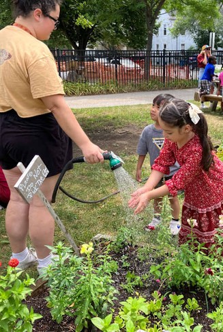 Young students doing activities outside.