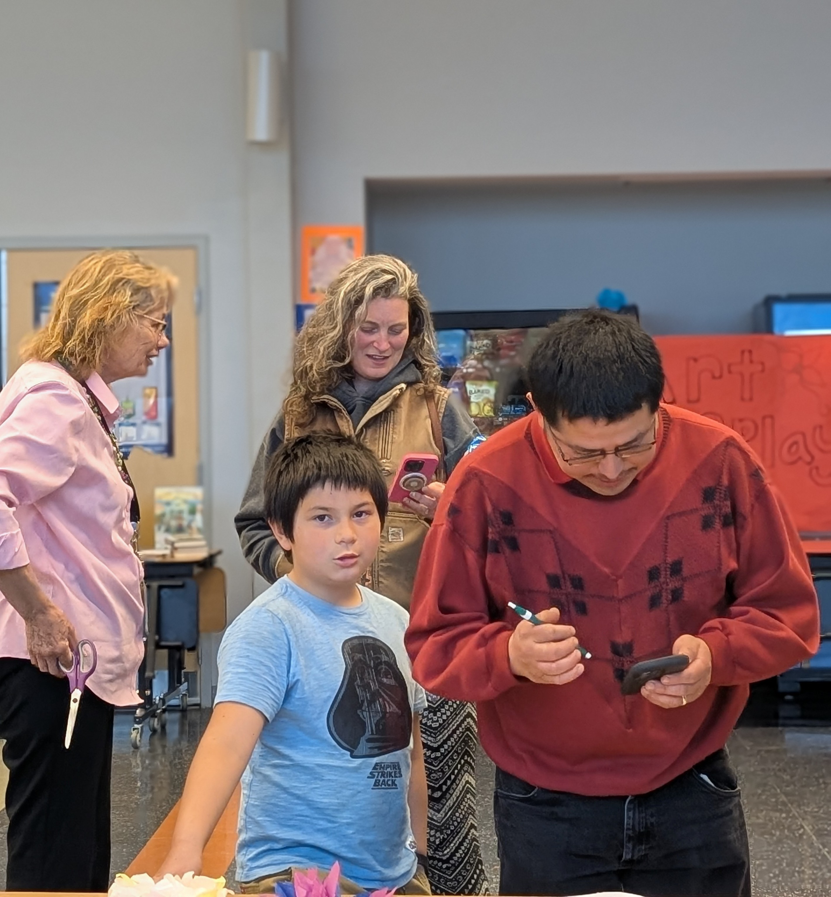 RSU 3 students, families, and staff share favorite words at the Language and Culture event.